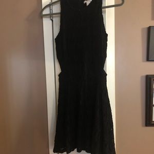 Sleeveless dress with side cutouts